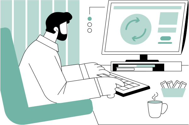 Person an Schreibtisch vor Computer