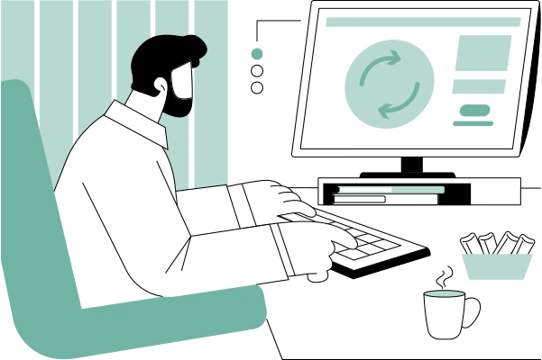 Person an Computer macht Softwareupdate